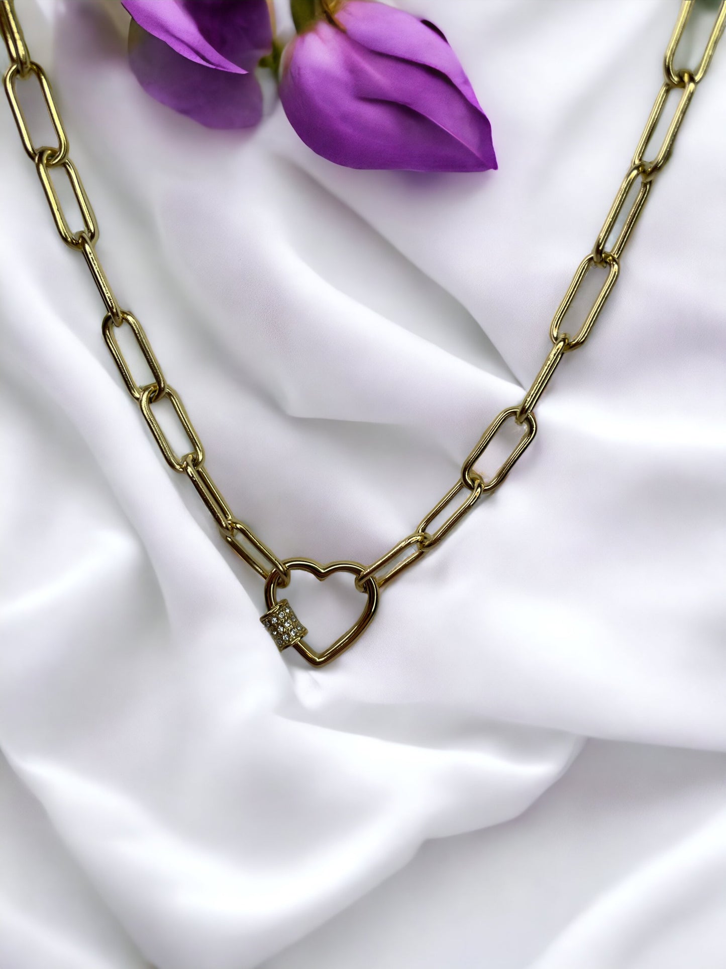 Material: Premium stainless steel for durability and longevity Finish: Luxuriously gold-plated, offering a radiant shine that captures the heart's warmth Chain Type: Delicate yet sturdy, perfect for everyday wear Clasp Type: Secure and easy-to-operate for hassle-free adornment Pendant Design: A symbol of the intertwined lives of a mother and her child, crafted with elegance and grace