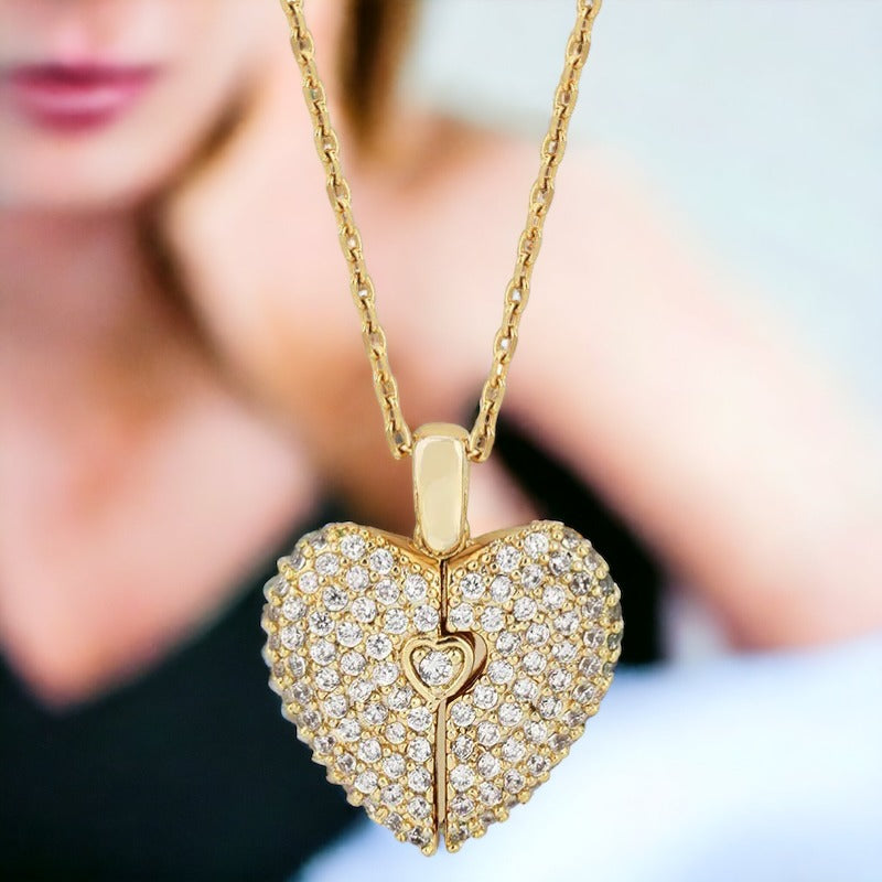 This enchanting piece captures the essence of togetherness, with two sets of footprints intertwined to form a heart, symbolizing the precious steps taken together by loved ones.  Available in both the timeless elegance of stainless steel and the warm glow of gold plating, this necklace is a versatile accessory that adds a touch of grace to any outfit. The heart at the center is a gentle reminder of the love that guides us and the shared experiences that shape our bonds.