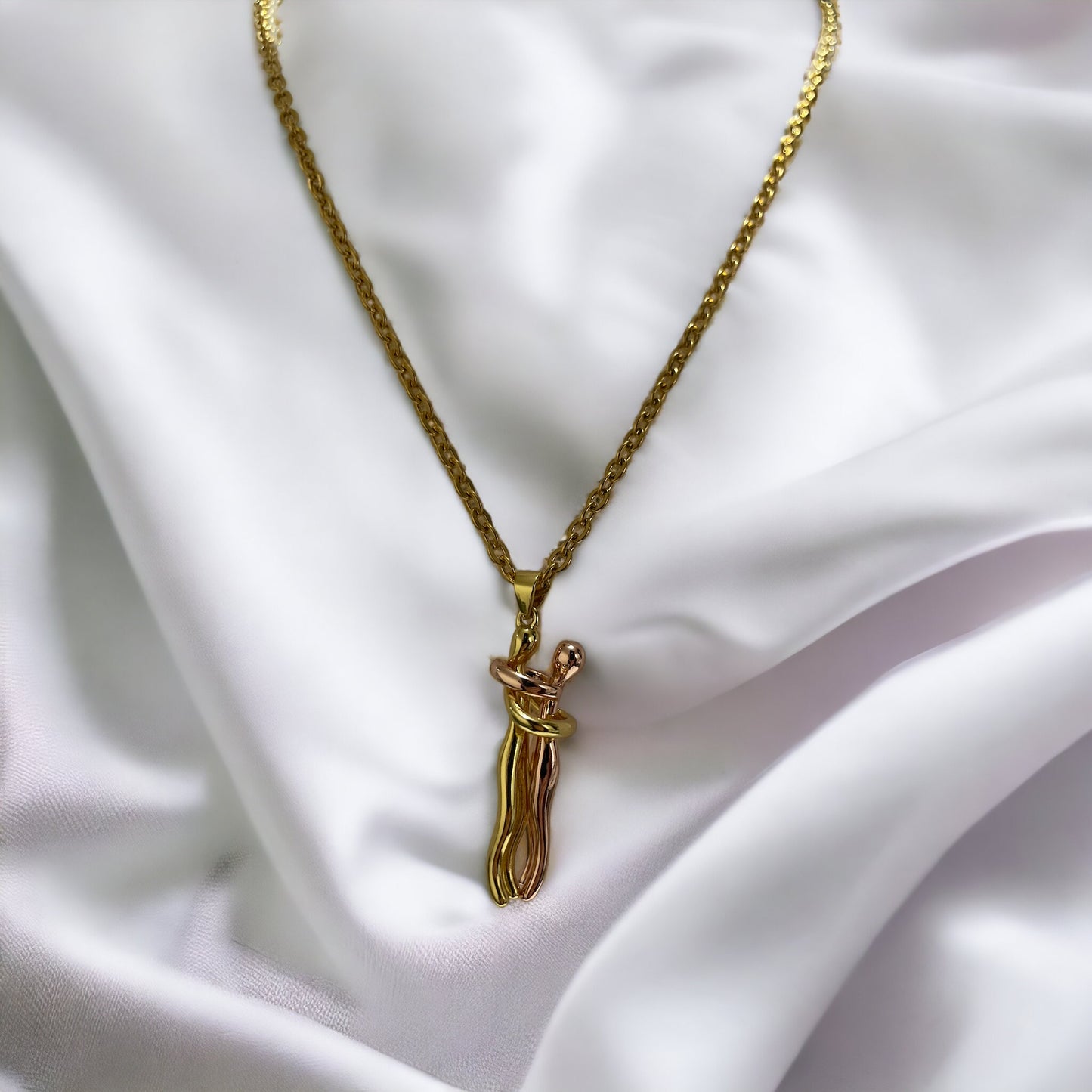 Add a playful charm to your jewelry collection with our Pendant Necklace. Crafted from stainless steel with a lustrous gold finish, this necklace features a whimsical cat figure pendant. The design captures the feline's curious and graceful nature, with a curled tail that adds a touch of whimsy.