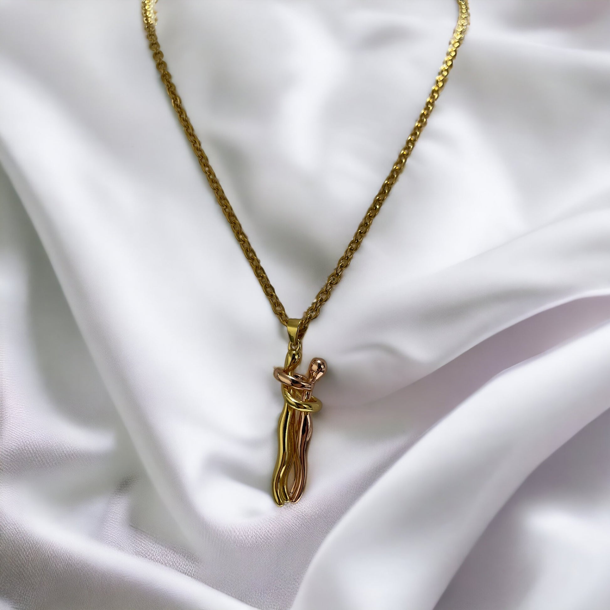 Add a playful charm to your jewelry collection with our Pendant Necklace. Crafted from stainless steel with a lustrous gold finish, this necklace features a whimsical cat figure pendant. The design captures the feline's curious and graceful nature, with a curled tail that adds a touch of whimsy.