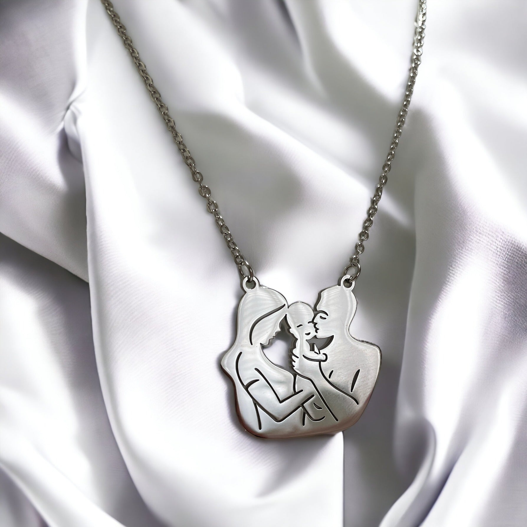 Embrace the tender connection of motherhood with our Mother & Child Silhouette Necklace. Each piece is meticulously crafted from the highest quality stainless steel, ensuring a lasting shine and durability. The pendant captures the precious bond between a mother and her child in a delicate silhouette, creating a powerful symbol of love and unity.