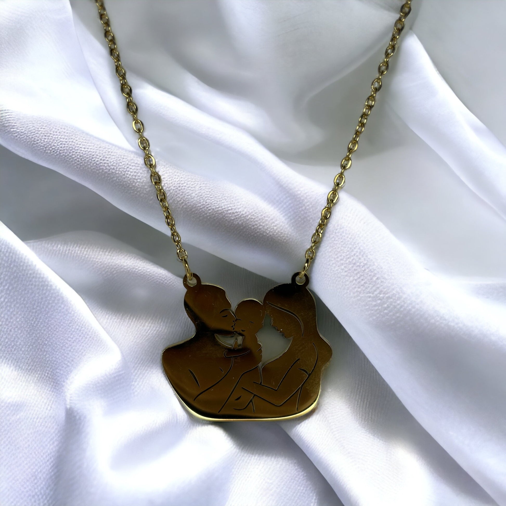 Embrace the tender connection of motherhood with our Mother & Child Silhouette Necklace. Each piece is meticulously crafted from the highest quality stainless steel, ensuring a lasting shine and durability. The pendant captures the precious bond between a mother and her child in a delicate silhouette, creating a powerful symbol of love and unity.