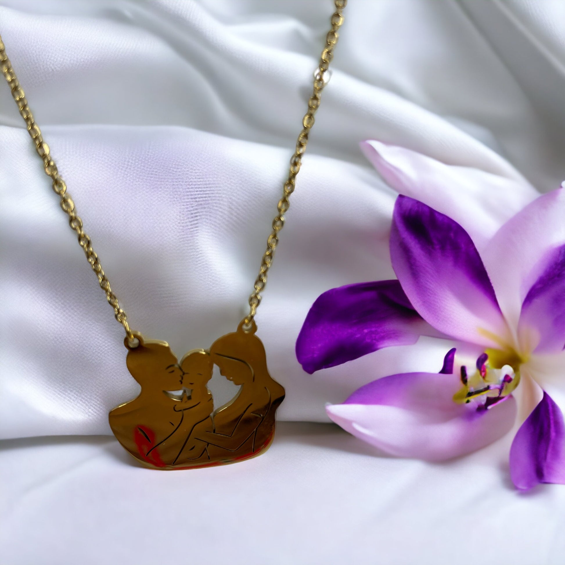 Embrace the tender connection of motherhood with our Mother & Child Silhouette Necklace. Each piece is meticulously crafted from the highest quality stainless steel, ensuring a lasting shine and durability. The pendant captures the precious bond between a mother and her child in a delicate silhouette, creating a powerful symbol of love and unity.