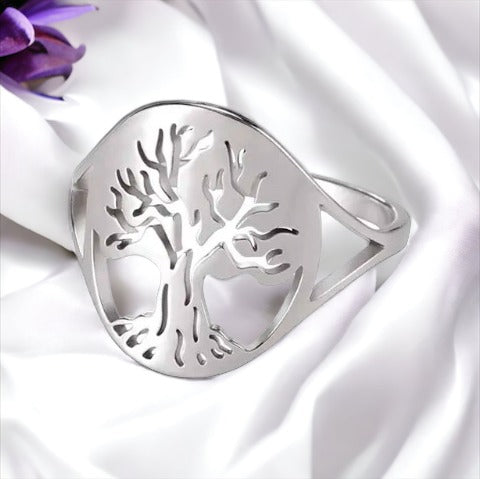 Material: Crafted from high-quality stainless steel for durability and longevity. Plating: Radiant gold plating offers a luxurious and sophisticated sheen. Design: The tree of life symbol is delicately cut out to capture the beauty of its sprawling branches and rooted connection. Fit: Smooth interior for a comfortable fit, suitable for daily wear. Versatility: Elegant for special occasions yet simple enough for everyday wear. Sizes: Available in multiple sizes to ensure a perfect fit for everyone.
